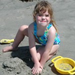 Raquel works the sand